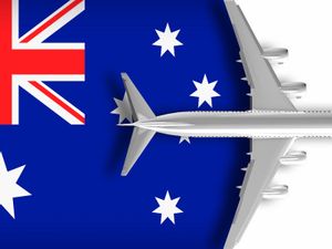 Australia flag with a 3D airplane flying over