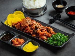 Korean food, fried pork, Jeyuk Bokkeum, with sauce.