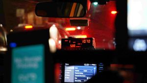 Taxi meter inside a cab. Credit: Unsplash.